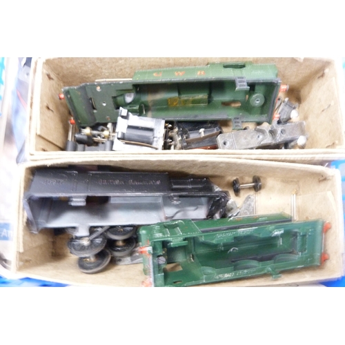 28 - Two cartons containing Great Western clockwork locomotive, parts, Tri-ang Railways 00 gauge B256 loc... 