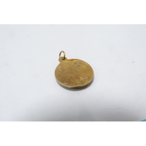 288 - 9ct gold cross pendant attached to a yellow metal chain, two other 9ct gold pendants, gold weight ap... 