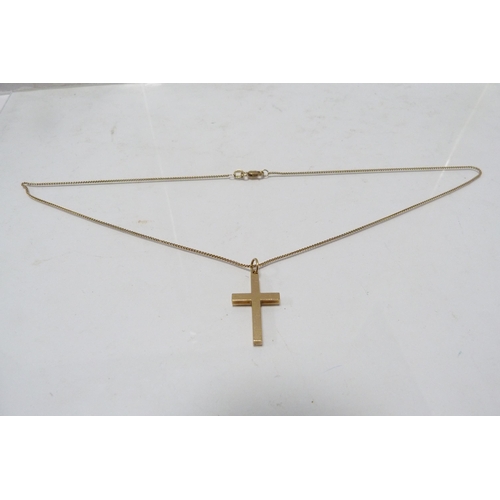 291 - 9ct gold cross pendant on 9ct gold lady's chain, 5.9g gross.