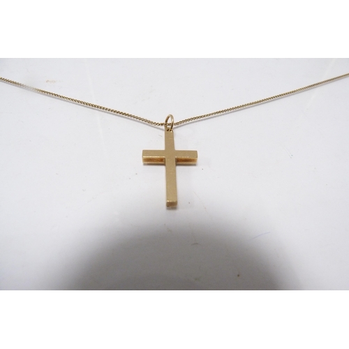 291 - 9ct gold cross pendant on 9ct gold lady's chain, 5.9g gross.