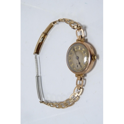 296 - Antique 9ct gold-backed lady's wristwatch, on rolled gold strap, 17.3g gross.