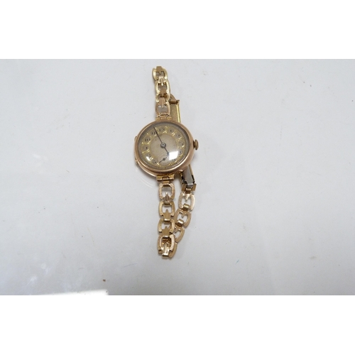 296 - Antique 9ct gold-backed lady's wristwatch, on rolled gold strap, 17.3g gross.