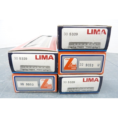 30 - Carton containing boxed Lima coaches to include 5329, 9053, loose BR examples, Tri-ang and Hornby 00... 