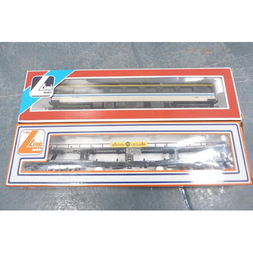 30 - Carton containing boxed Lima coaches to include 5329, 9053, loose BR examples, Tri-ang and Hornby 00... 