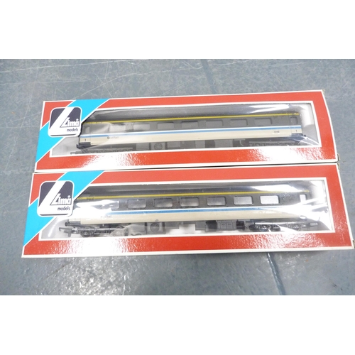 30 - Carton containing boxed Lima coaches to include 5329, 9053, loose BR examples, Tri-ang and Hornby 00... 