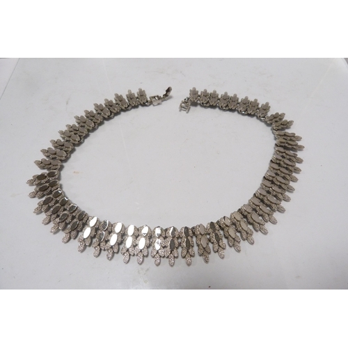 306 - Suite of white metal costume jewellery comprising a Victorian-style chain, bracelet and a pair of ea... 