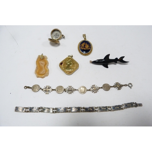 314 - Quantity of costume jewellery brooches, badges, cufflinks, necklaces etc., contained in a vanity cas... 