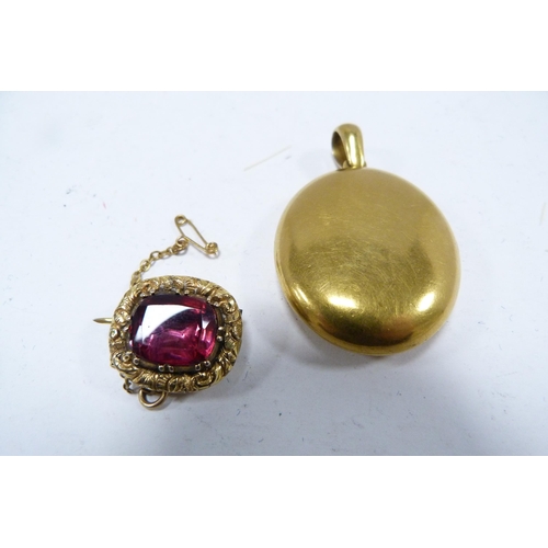 326 - Antique unmarked pink topaz-set brooch with safety chain, and a locket.  (2)