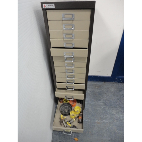 335 - Easiscan fifteen drawer filing cabinet and a selection of hole saws.