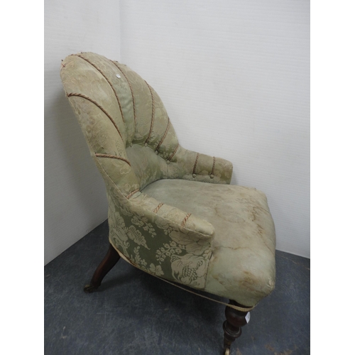 339 - Antique button-back armchair on brass castors.