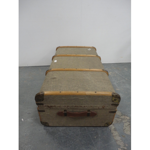 345 - Wood-bound and canvas travel trunk.