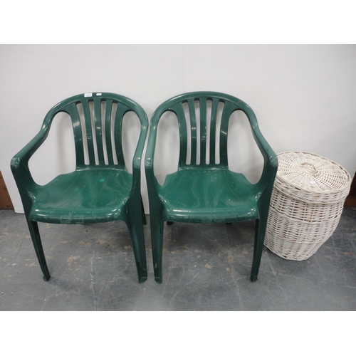 346 - Wicker laundry basket and two green stacking chairs.  (3)