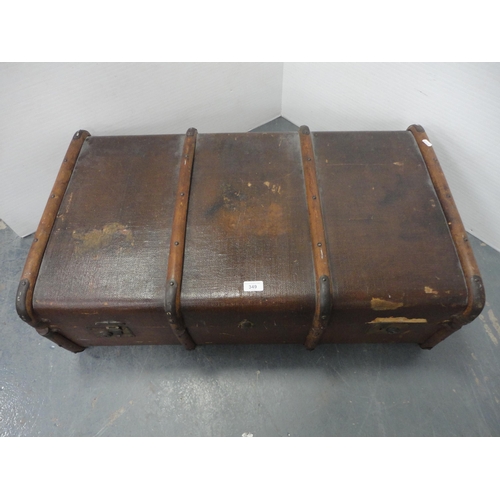 349 - Wood-bound travel trunk.