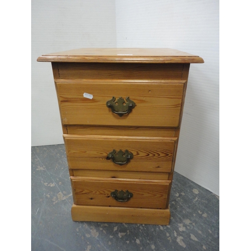 355 - Pair of pine three-drawer bedside chests.