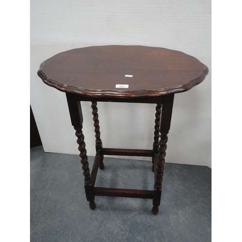 361 - Oak window table and a mahogany circular occasional table. (2)