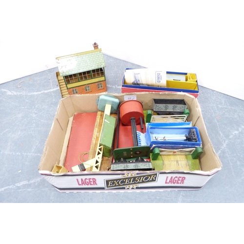 37 - Three cartons containing a collection of model railway buildings, accessories, tinplate building, bo... 