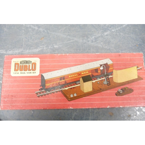 37 - Three cartons containing a collection of model railway buildings, accessories, tinplate building, bo... 