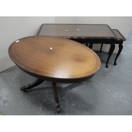 370 - Mahogany oval coffee table and a nest of three tables.