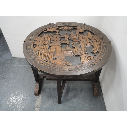 373 - Japanese-style carved circular folding table.