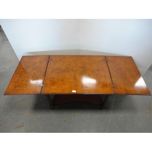 385 - Walnut extending coffee table with undertier.