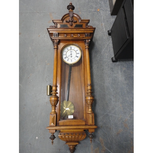 386 - Early 20th century Vienna wall clock with single brass weight.