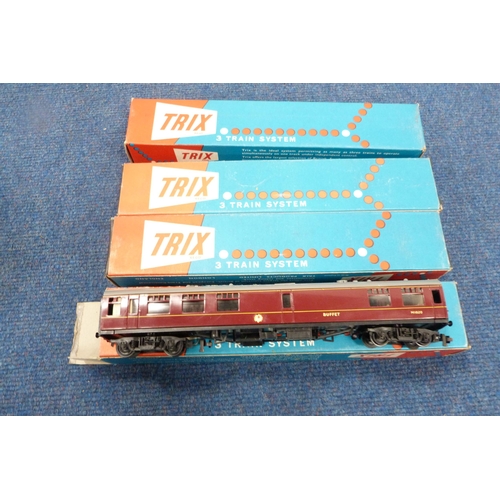 4 - Carton containing 00 gauge coaches, boxed Trix and other track, rolling stock etc.