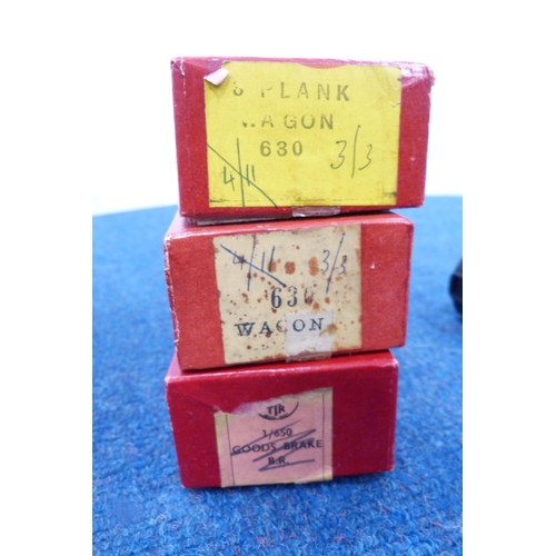 4 - Carton containing 00 gauge coaches, boxed Trix and other track, rolling stock etc.