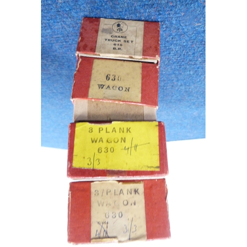 4 - Carton containing 00 gauge coaches, boxed Trix and other track, rolling stock etc.