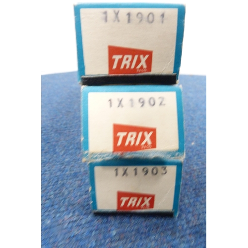 4 - Carton containing 00 gauge coaches, boxed Trix and other track, rolling stock etc.