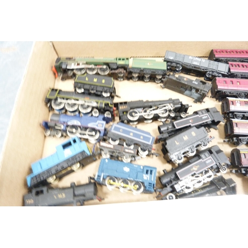 42 - Three cartons containing 00 gauge parts and accessories, rolling stock, tender, track, building acce... 