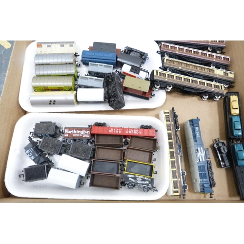 42 - Three cartons containing 00 gauge parts and accessories, rolling stock, tender, track, building acce... 