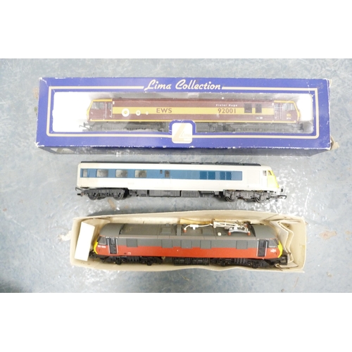 46 - Carton containing mainly 00 gauge coaches, locomotives, wagons, boxed Lima L2672 class 92001 locomot... 