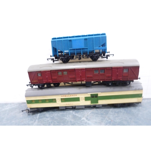 49 - Two cartons containing 00 gauge coaches, rolling stock, wagons, 6024 part locomotive, track, lorry, ... 