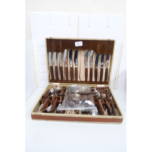 64 - Canteen of cutlery with wooden handles, boxed fish knives and forks, spoons and other boxed cutlery ... 