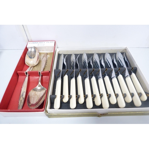 64 - Canteen of cutlery with wooden handles, boxed fish knives and forks, spoons and other boxed cutlery ... 