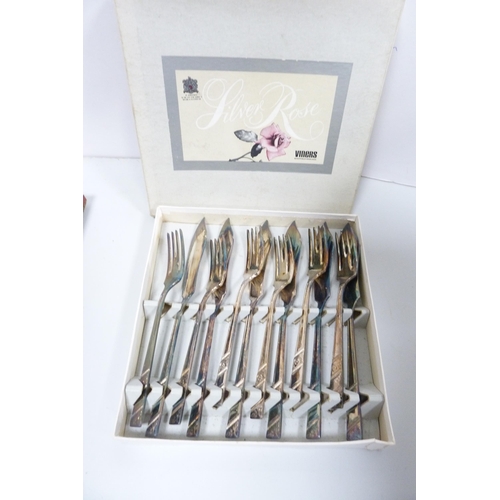 64 - Canteen of cutlery with wooden handles, boxed fish knives and forks, spoons and other boxed cutlery ... 