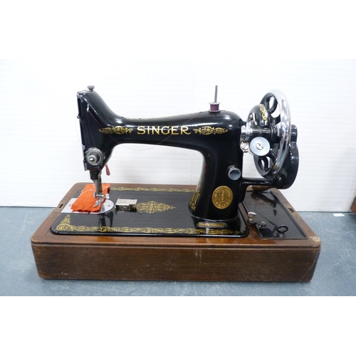 65 - Singer portable sewing machine in fitted case, no. EB652985.