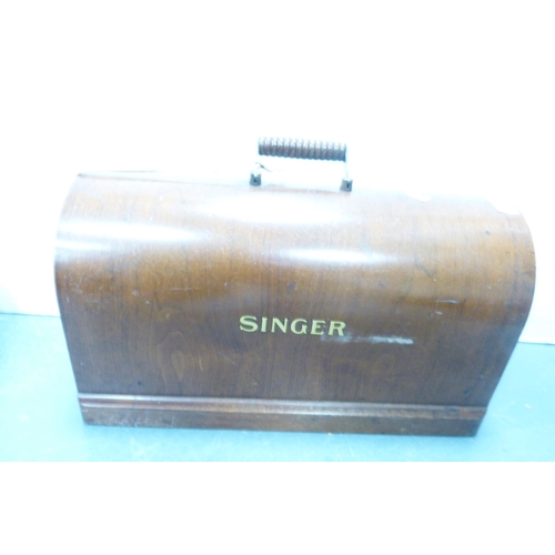 65 - Singer portable sewing machine in fitted case, no. EB652985.