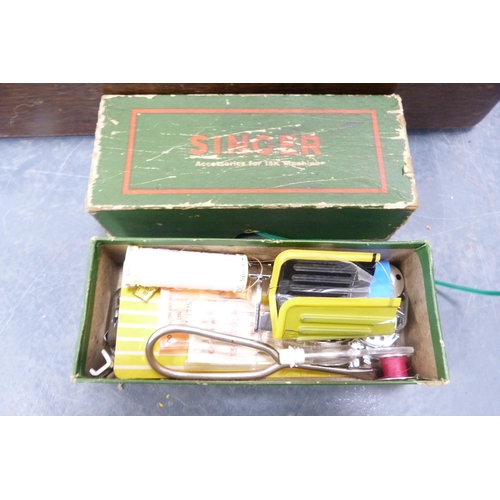 65 - Singer portable sewing machine in fitted case, no. EB652985.