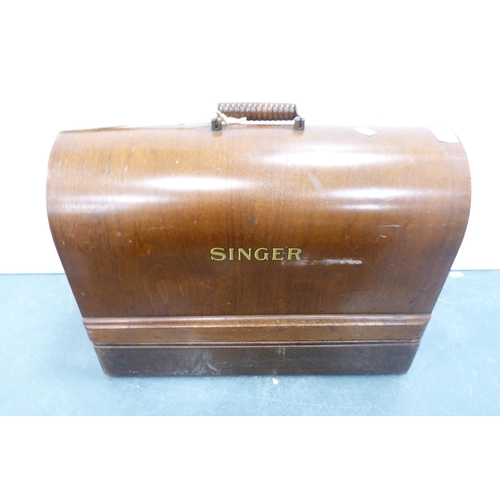 65 - Singer portable sewing machine in fitted case, no. EB652985.