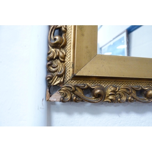 69 - Regency-style gilt framed wall mirror.