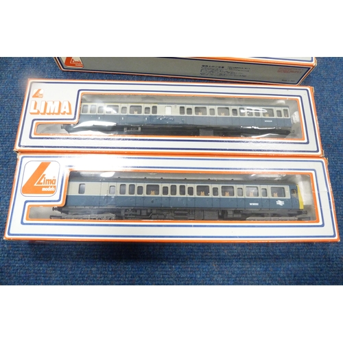 7 - Carton containing four Lima 00 gauge coaches, Lima locomotives, boxed Mainline Railways BGLMS maroon... 