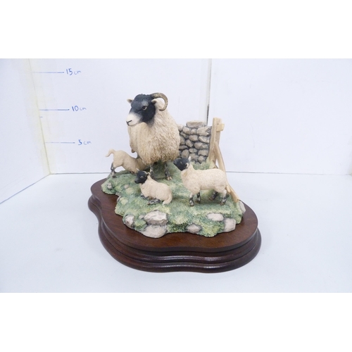 79 - Two Border Fine Arts groups to include dogs and sheep, both sculpted by Ray Ayres.  (2)