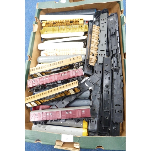 9 - Two cartons containing 00 gauge model railway parts to include rolling stock, tenders, wheels, bogey... 