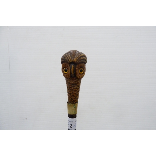 92 - Walking stick with carved nut pommel in the form of an owl, glass walking stick with circular pommel... 