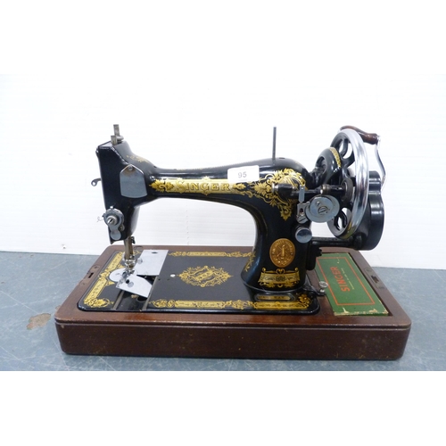 95 - Singer portable sewing machine, no. EA555369, in fitted case.