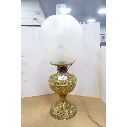 98 - Brass oil lamp with later shade and funnel and another converted oil lamp with funnel.  (2)