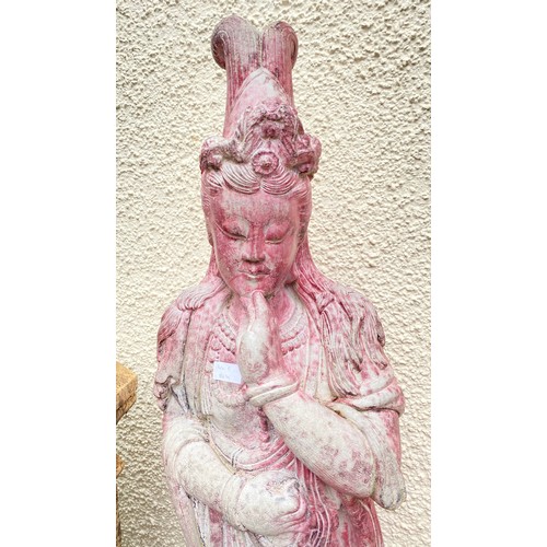 682 - Composite garden statue of an Asian deity, 137cm