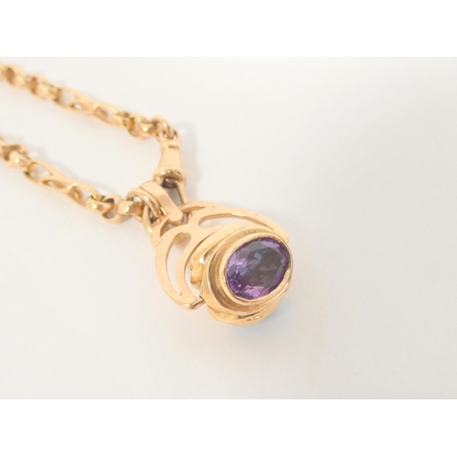 23 - Gold necklet of twist and belcher pattern '9kt' with similar swivel seal pendant. 34g. 