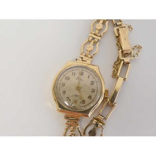 33 - Lady's Lada 9ct watch on a similar bracelet. 15g gross. 